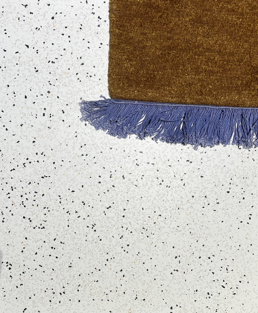 FotoDe look van terrazzo, het comfort van een gietvloer